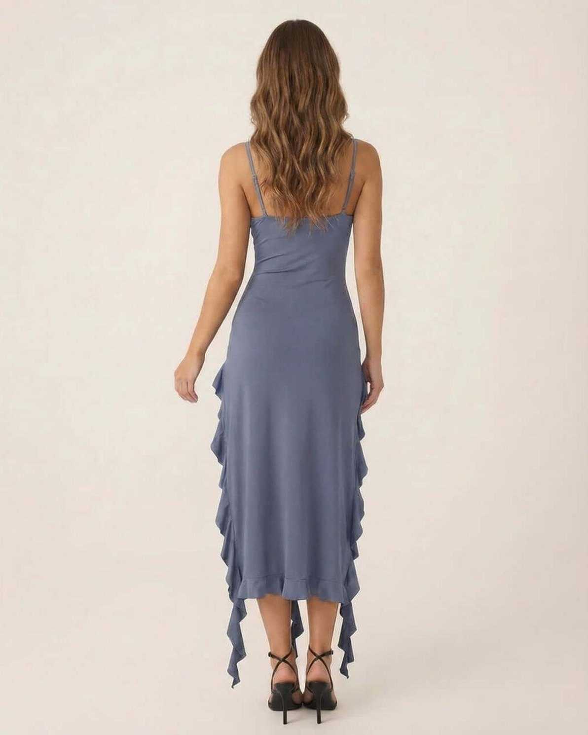 Back view of the Filicudi Midi Dress showcasing ruffle details, perfect for elegant occasions. RAMBLION brand.