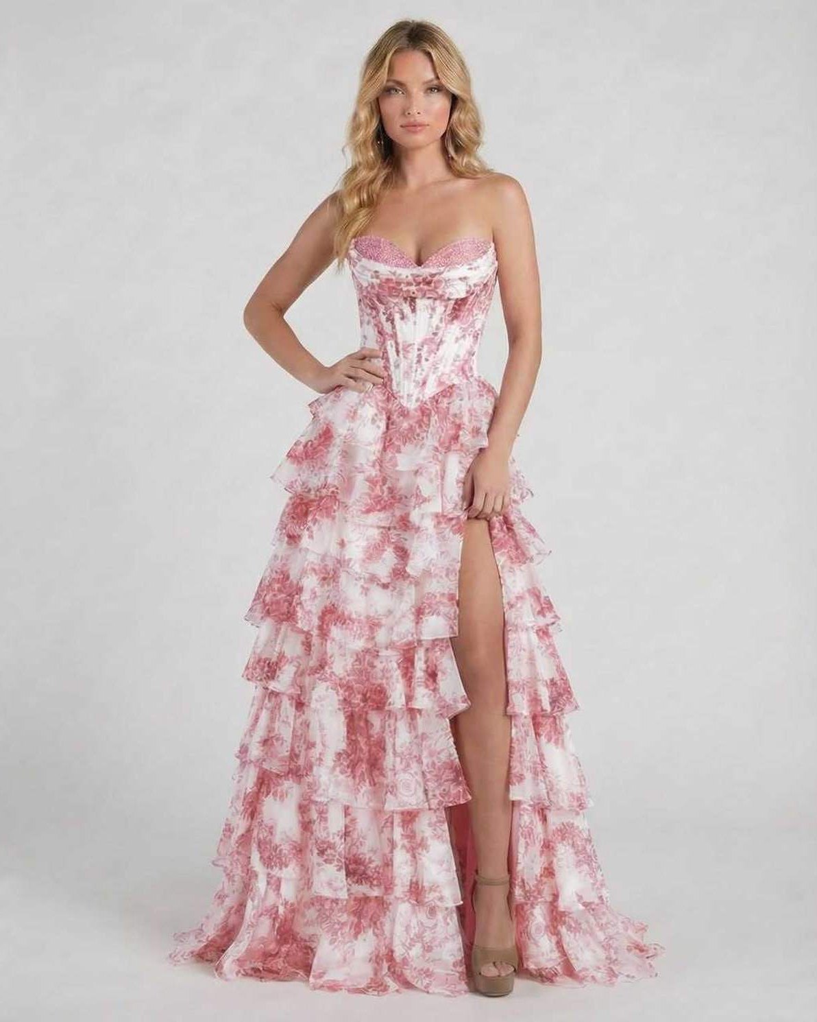 Filo Maxi Dress by RAMBLION, strapless, pink floral pattern, tiered design, elegant piece for special occasions.