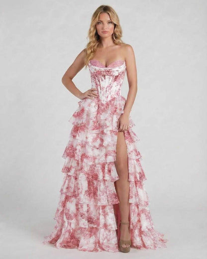 Filo Maxi Dress by RAMBLION, strapless, pink floral pattern, tiered design, elegant piece for special occasions.