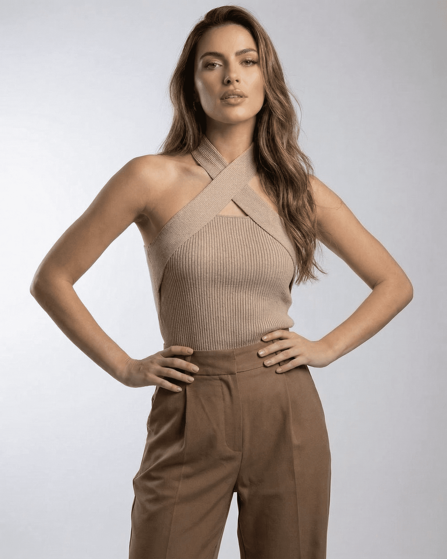Fima Top beige mini dress with halter neckline, ribbed texture, versatile for casual and elevated occasions by RAMBLION