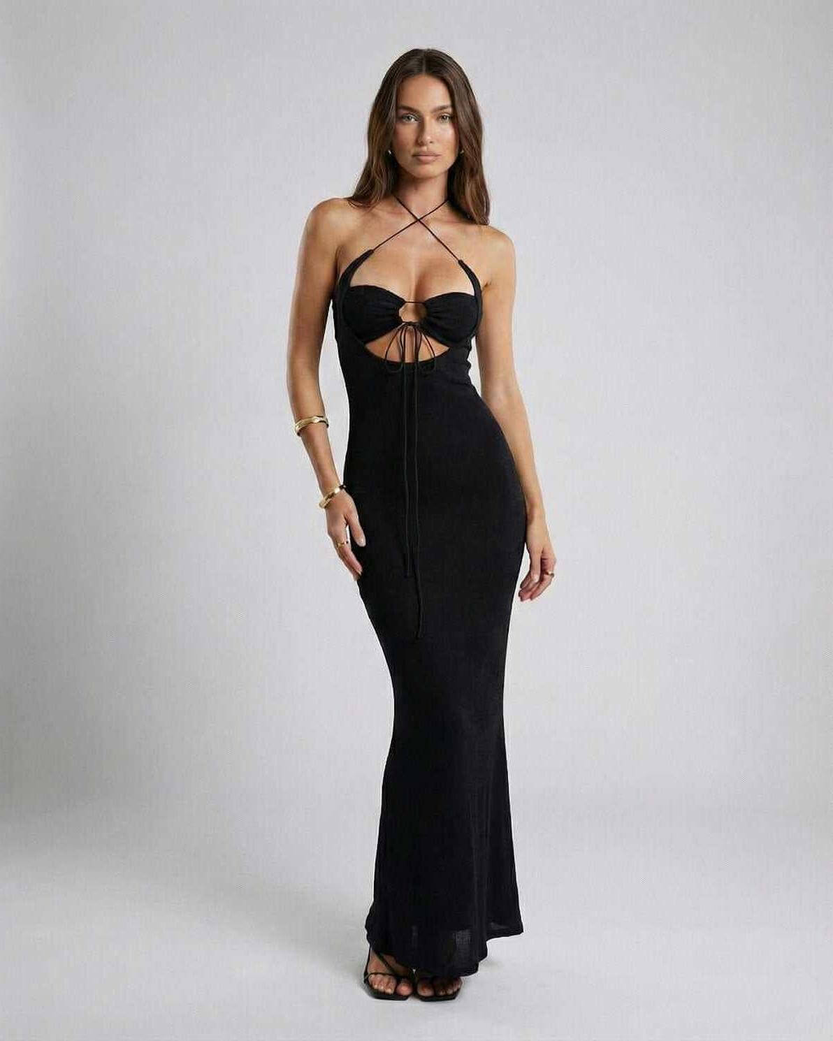 Fira Maxi Dress in black, ankle-length, halter style, 100% polyester satin, perfect for modern sophistication and elegant occasions by RAMBLION.