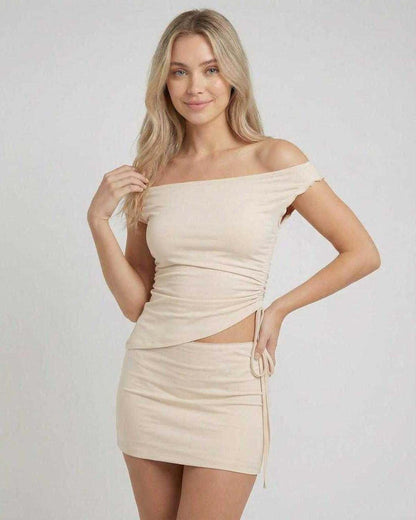 Fira Mini Dress in beige, off-shoulder style, 100% cotton, for a chic, comfortable look by RAMBLION.