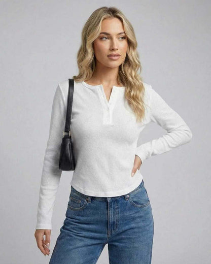 Gand Top white long sleeve top by RAMBLION, featuring round neck, perfect for polished casual wear.