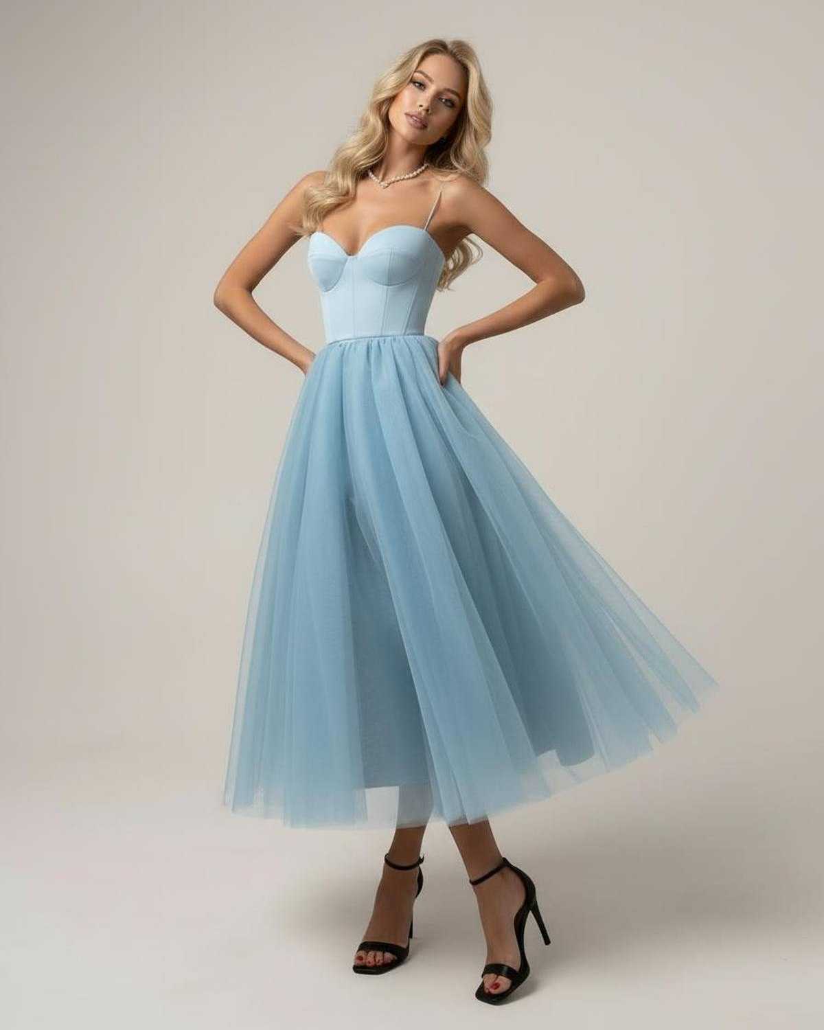 Haze Midi Dress in serene blue, featuring a structured corset bodice and flowing tulle skirt by RAMBLION.