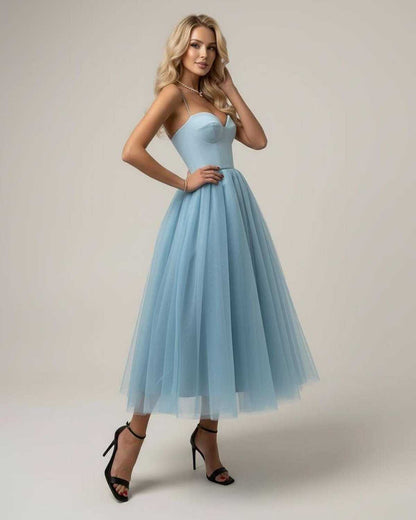 Haze Midi Dress by RAMBLION, serene blue tulle, structured corset bodice, perfect for elegant occasions.