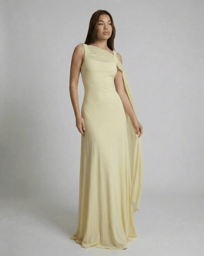 Hira Maxi Dress in light yellow, elegant slip design, square neckline, perfect for special occasions, by RAMBLION.