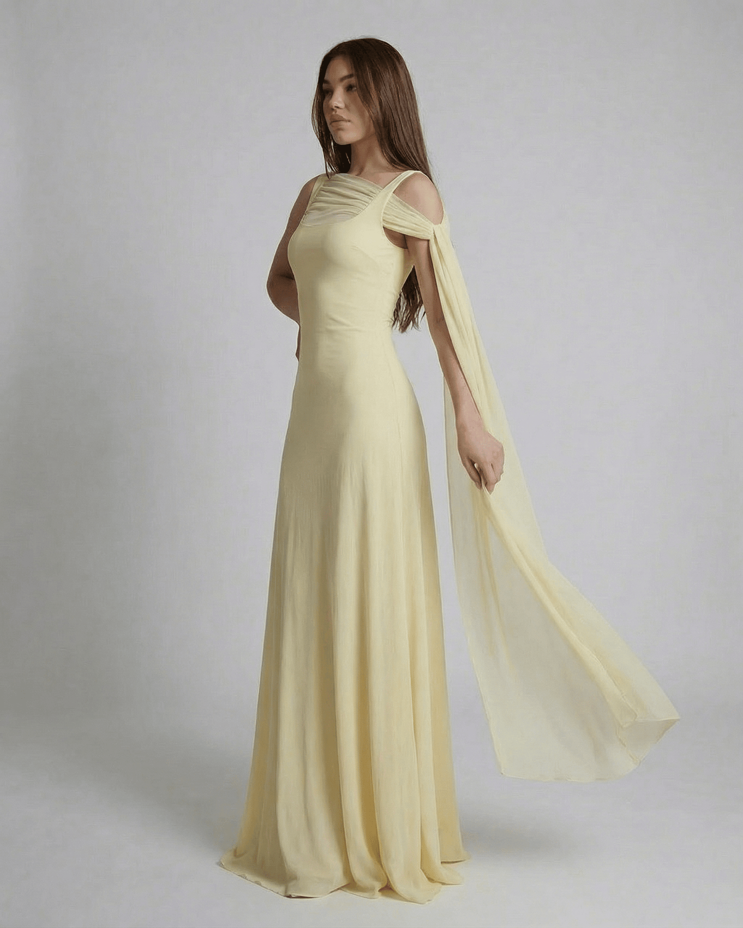 Hira Maxi Dress in light yellow, featuring a square neck, elegant design, perfect for special occasions, by RAMBLION.