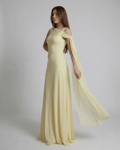 Hira Maxi Dress in light yellow, featuring a square neck, elegant design, perfect for special occasions, by RAMBLION.