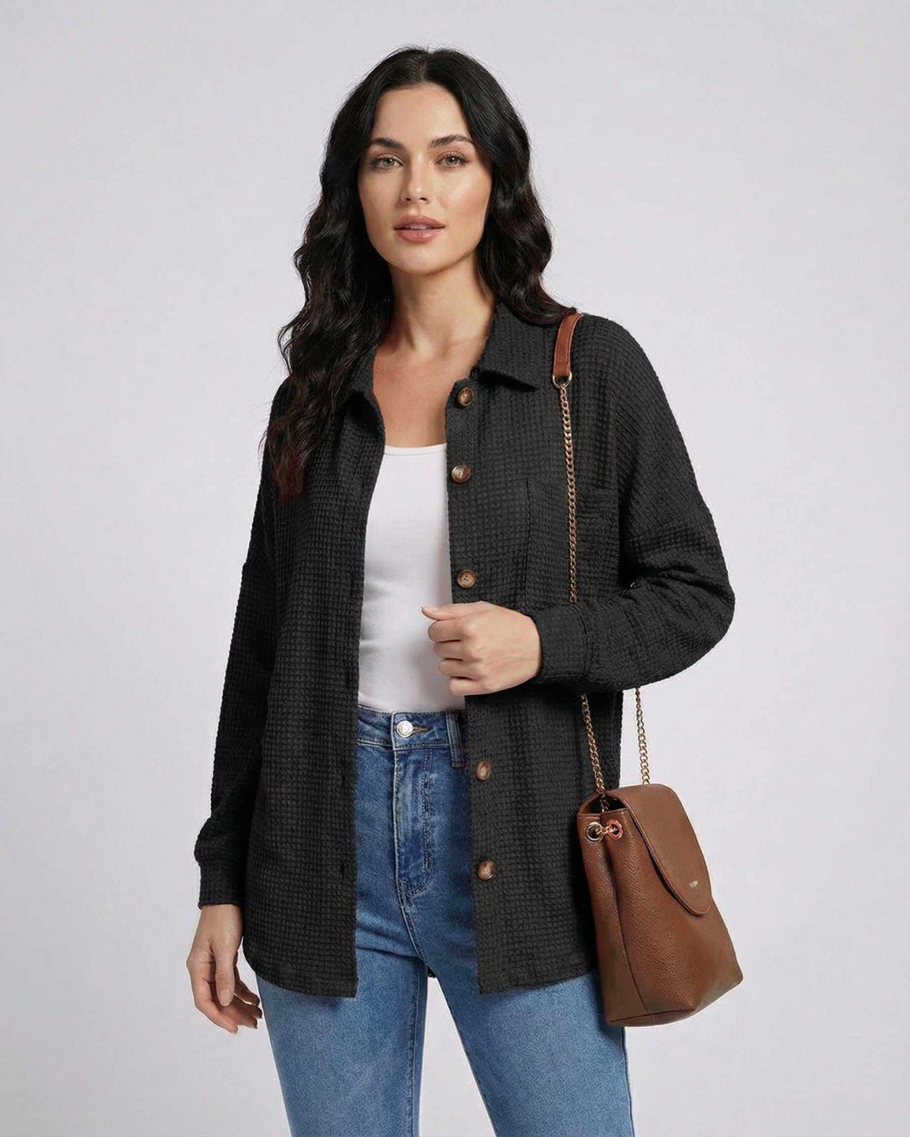 Ibiz Jacket by RAMBLION, black waffle knit, modern silhouette, chic styling for relaxed occasions.