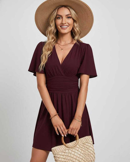 Ramblion Ila mini dress — v-neck neckline · side detail · styled for prom season
