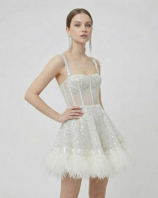 Inca Mini Dress by RAMBLION, white sequined mini dress with faux-fur hem, perfect for special occasions.