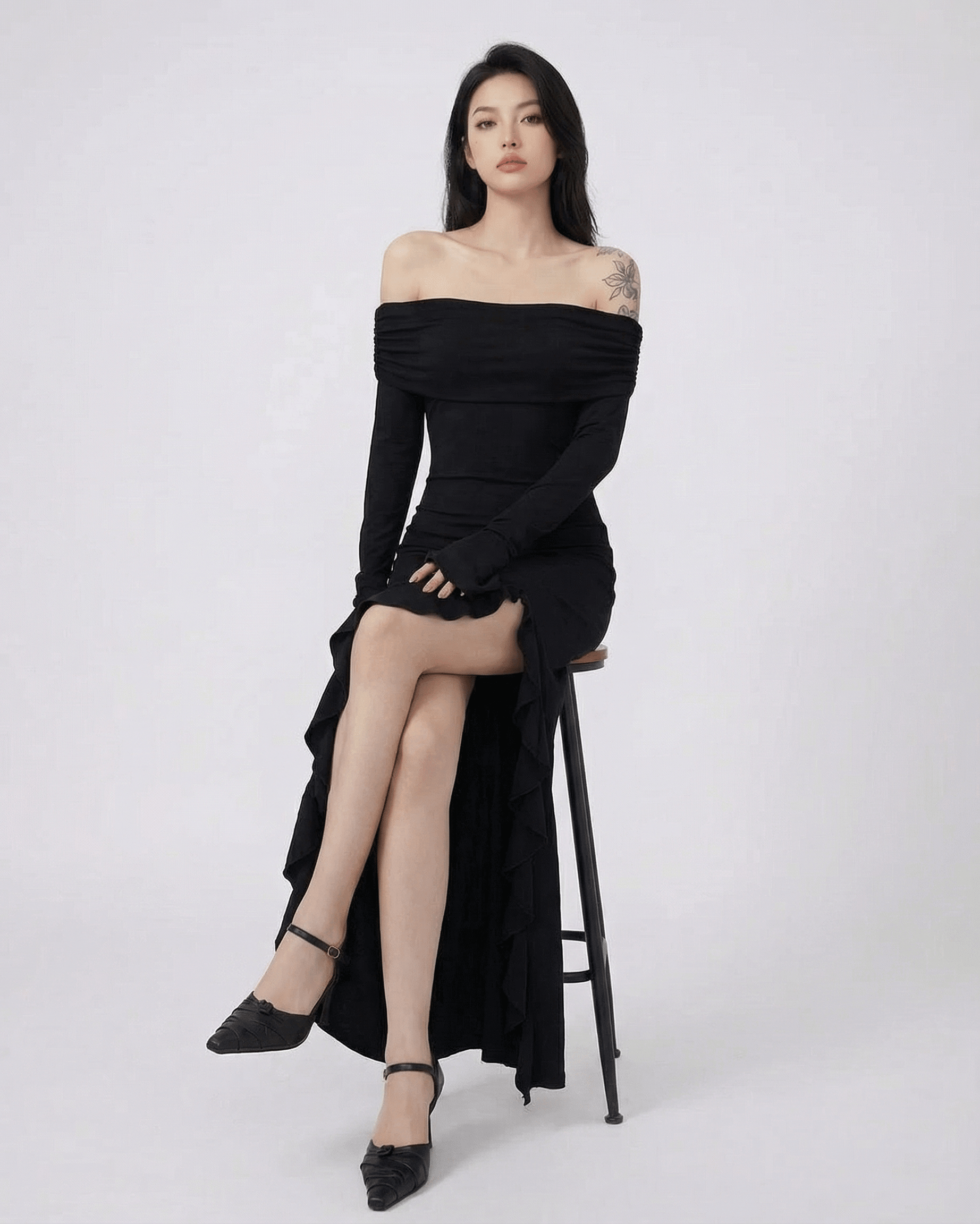 Isis Maxi Dress featuring off-shoulder design, asymmetrical ruffles, elegant black color by RAMBLION.
