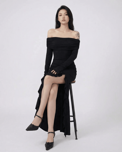 Isis Maxi Dress featuring off-shoulder design, asymmetrical ruffles, elegant black color by RAMBLION.