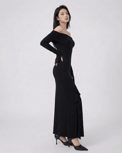 Isis Maxi Dress from RAMBLION, elegant off-shoulder black dress with asymmetrical ruffle, perfect for special occasions.