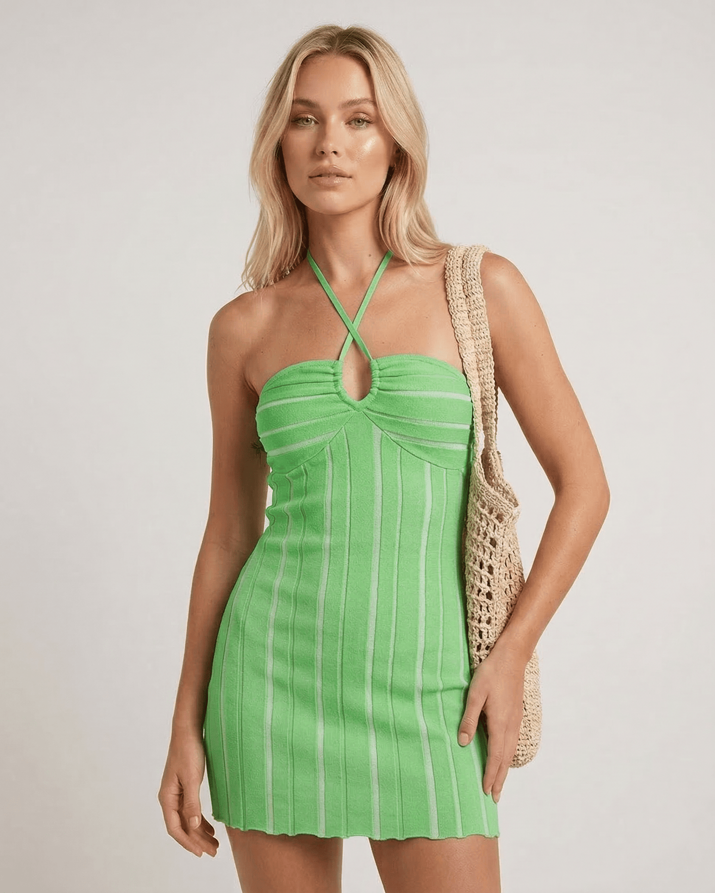 Isis Mini Dress by RAMBLION, vibrant green, 100% cotton, halter design, perfect for stylish summer occasions.