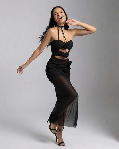 Jaca Maxi Dress by RAMBLION, halter style, elegant black gown, perfect for upscale events, blends comfort and sophistication.