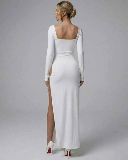 Jado Maxi Dress - Elegant white ankle-length dress with long sleeves, showcasing a modern silhouette by RAMBLION.