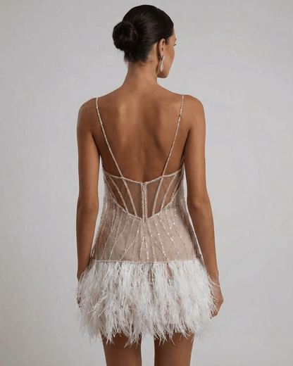 Jara Mini Dress by RAMBLION, light blue tulle, sequin finish, perfect for celebrations, featuring an airy, elegant design.