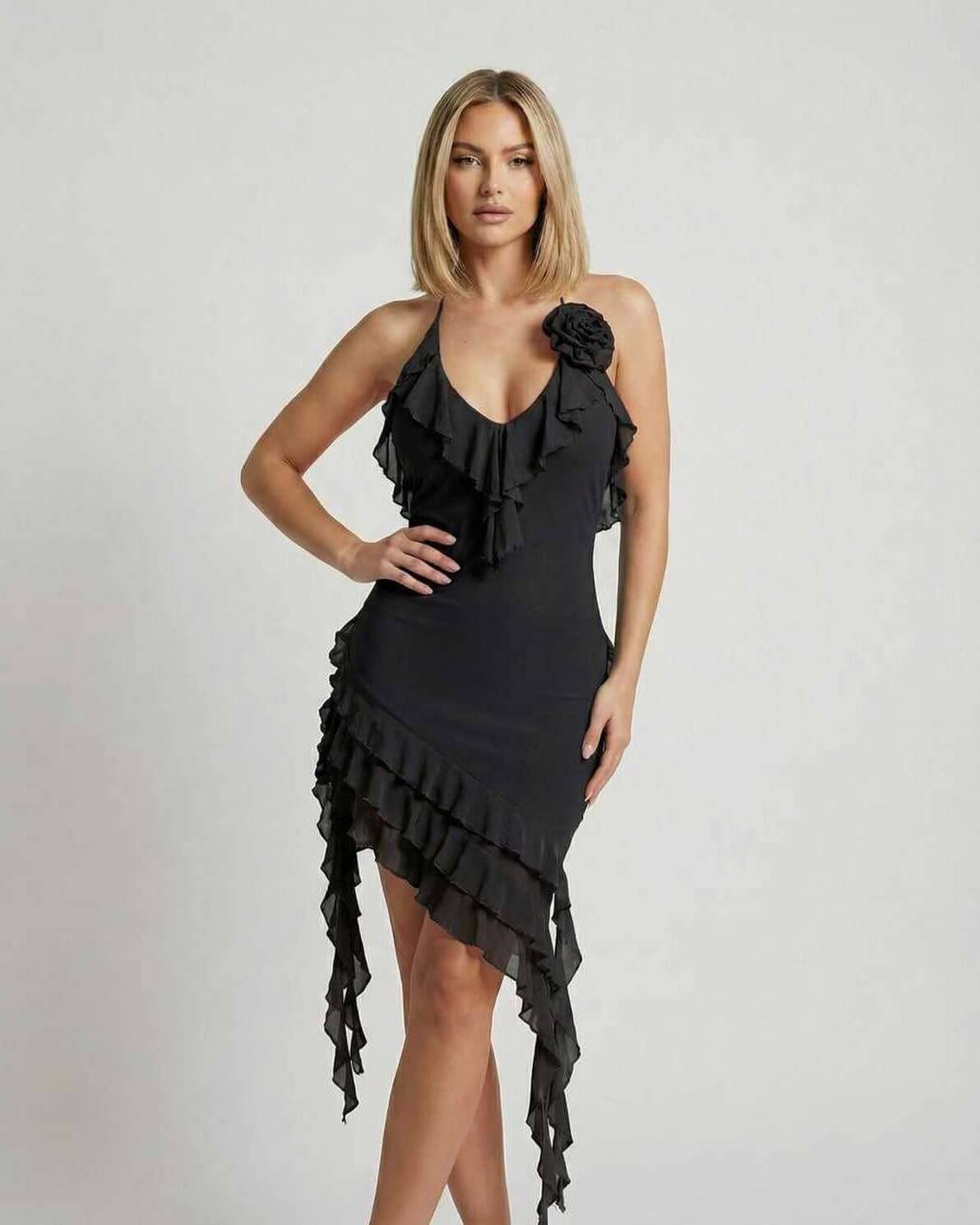 Juni Mini Dress by RAMBLION, black halter dress with ruffles, asymmetrical hem, perfect for formal occasions.