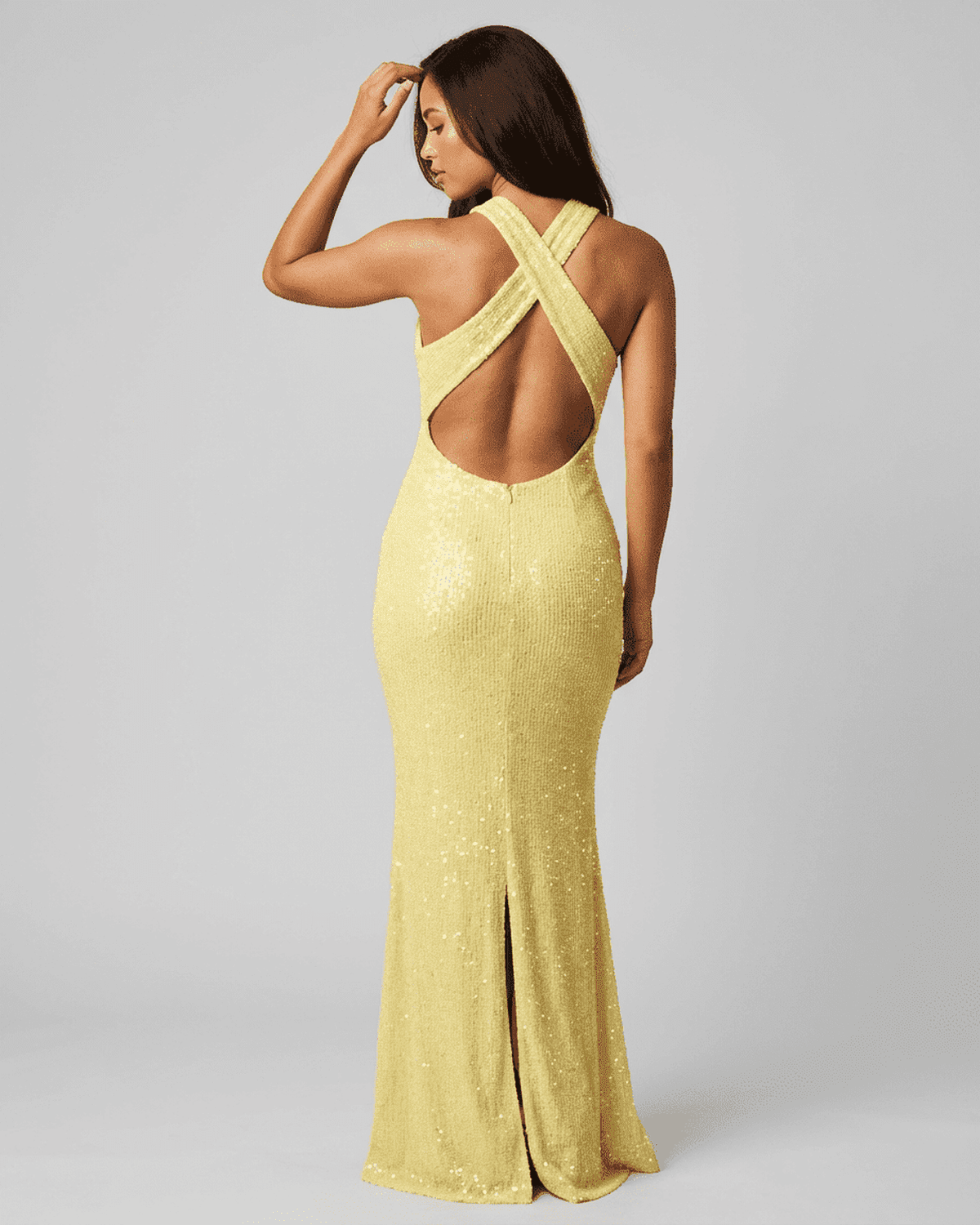 Back view of Kara Maxi Dress in yellow with sequin overlay, deep V-neck, perfect for special occasions by RAMBLION.