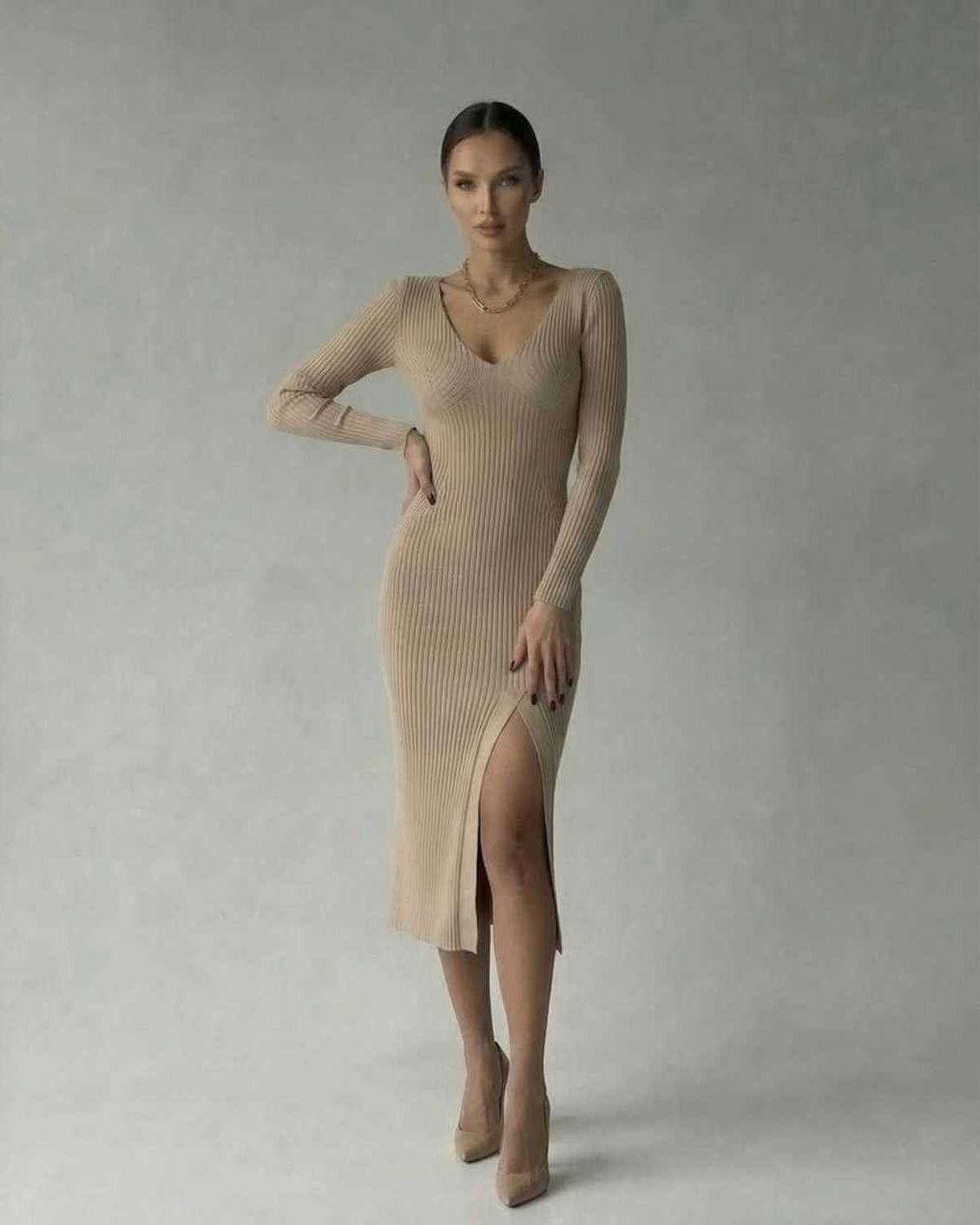 Kira Midi Dress in beige, featuring V neck, ribbed knit fabric, elegant style for sophisticated occasions by RAMBLION.