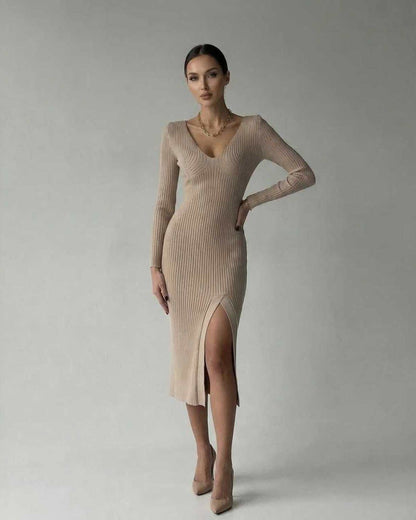 Kira Midi Dress featuring a V Neck, ribbed knit fabric, and sleek mid-calf design by RAMBLION, perfect for sophisticated occasions.