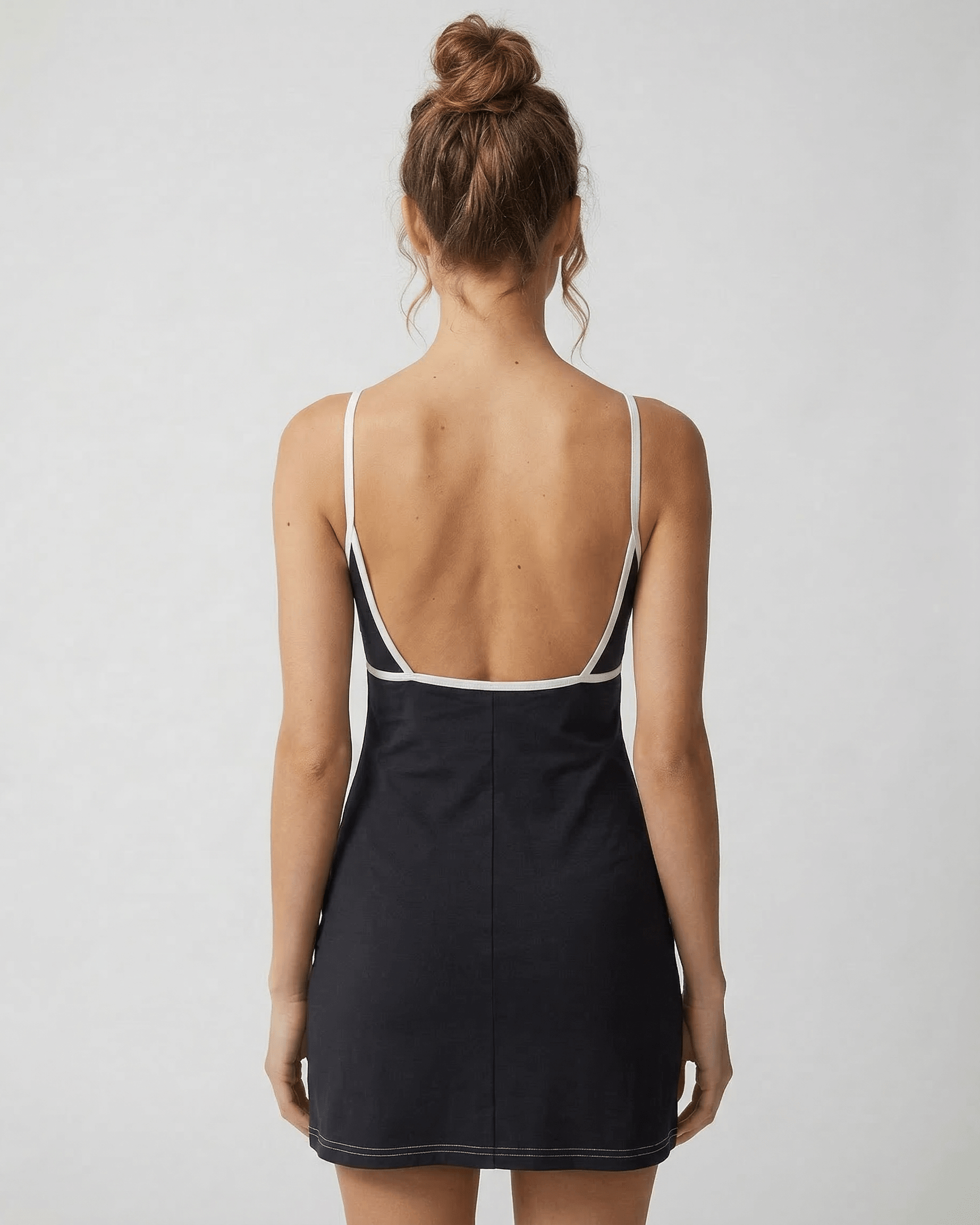 Kola Mini Dress by RAMBLION in black, featuring a V neck and cut-out detail, perfect for stylish occasions.
