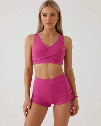 Kolo Set pink two piece with crop top and high waist shorts by RAMBLION, perfect for summer outings.