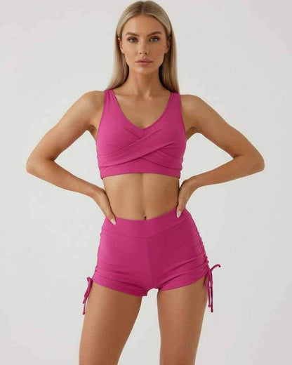 Kolo Set: Pink two piece set with sleeveless crop top and high waist shorts by RAMBLION, perfect for summer outings.