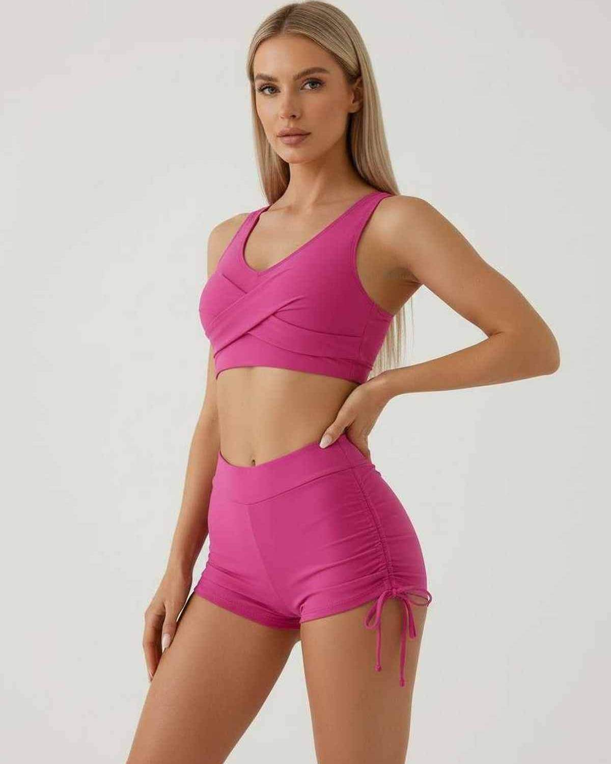 Kolo Set by RAMBLION: vibrant pink sleeveless crop top and high waist shorts for playful summer outings.