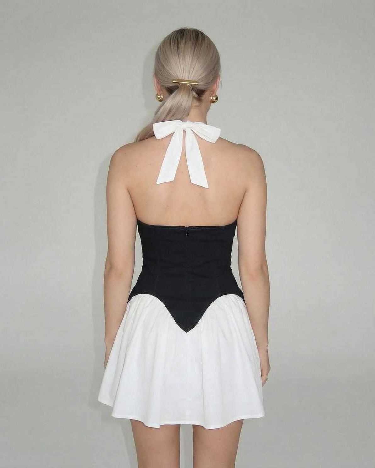 Koly Mini Dress - Black and white halter neck design, chic and playful, perfect for summer occasions, by RAMBLION.