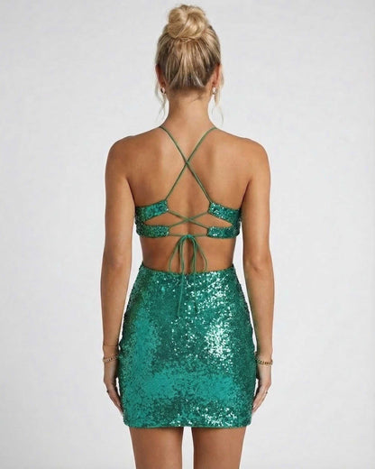 Koma Mini Dress: Green sequined mini dress with a stunning back detail, perfect for dazzling occasions. By RAMBLION.