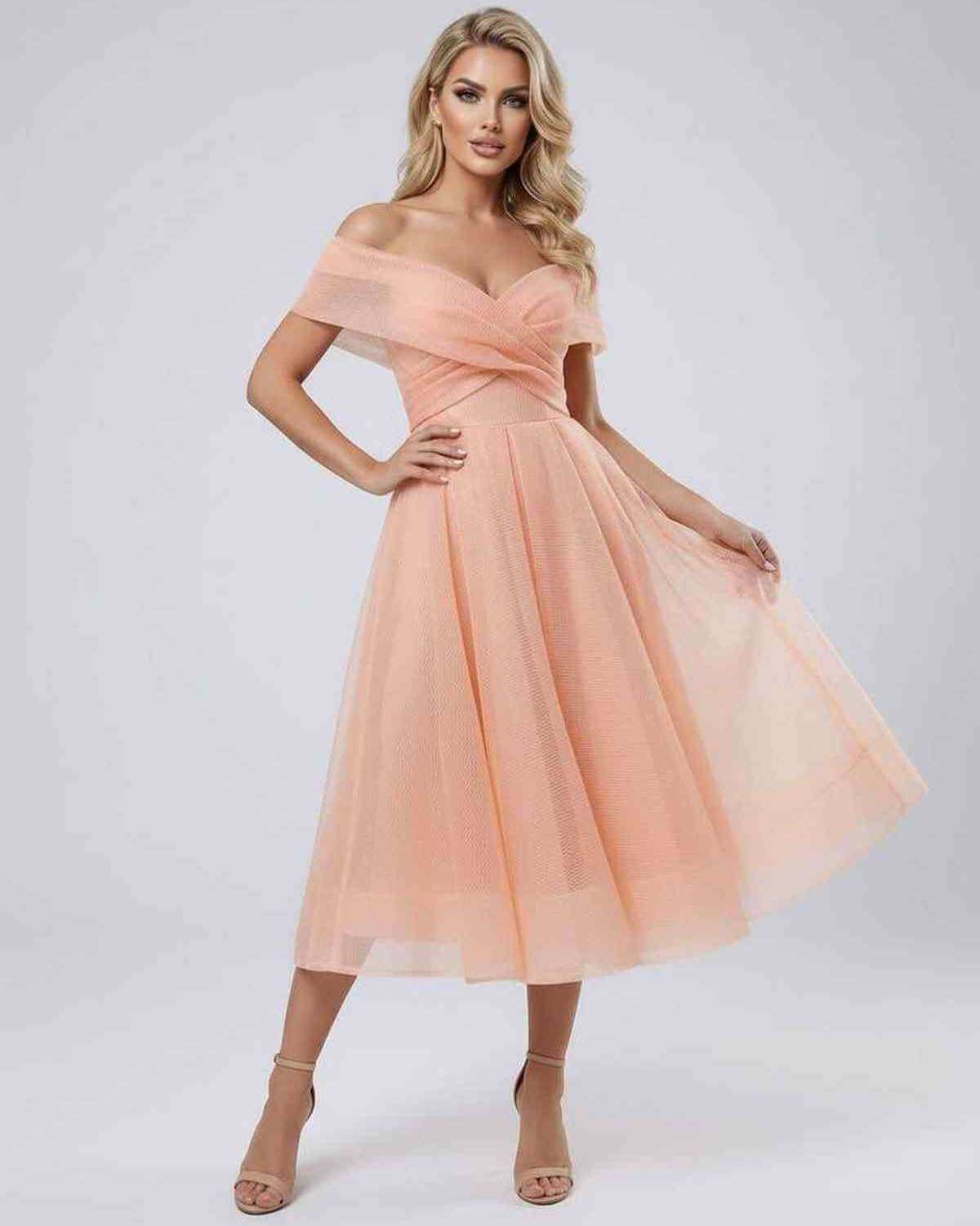 Kome Midi Dress by RAMBLION in soft peach, off-shoulder style, perfect for modern elegance at special occasions.