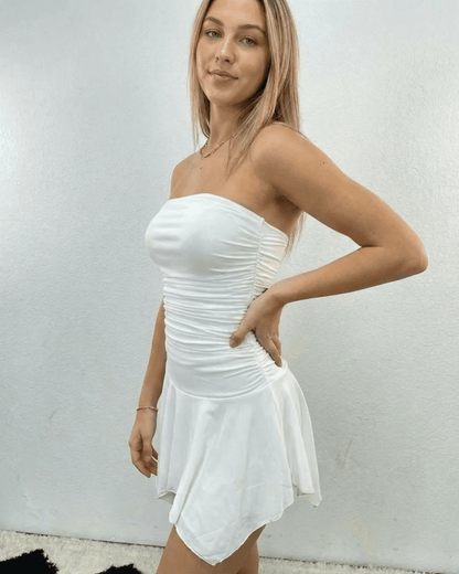 Laia Mini Dress showcasing a strapless design and stylish ruching, perfect for versatile occasions by RAMBLION.