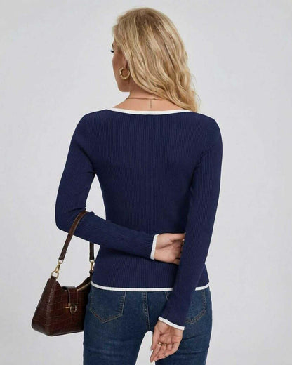 Back view of the Laia Sweater featuring ribbed knit, navy color, and stylish design by RAMBLION.