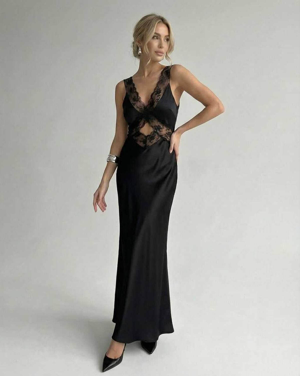 Lana Maxi Dress by RAMBLION, black ankle-length V-neck with delicate spaghetti straps, perfect for chic occasions.