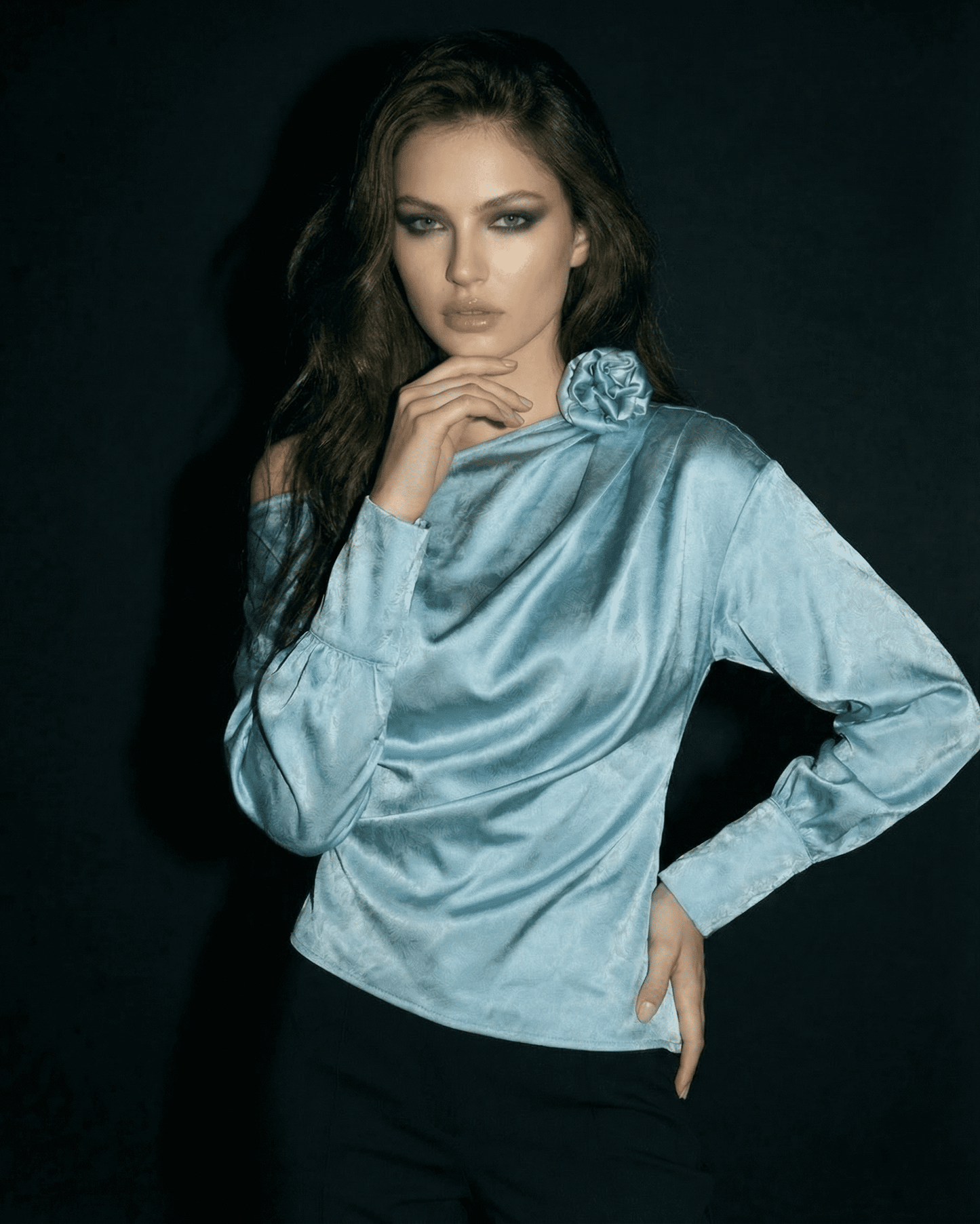 Lane Blouse in blue satin, featuring asymmetrical neckline and elegant draping for a sophisticated look by RAMBLION.