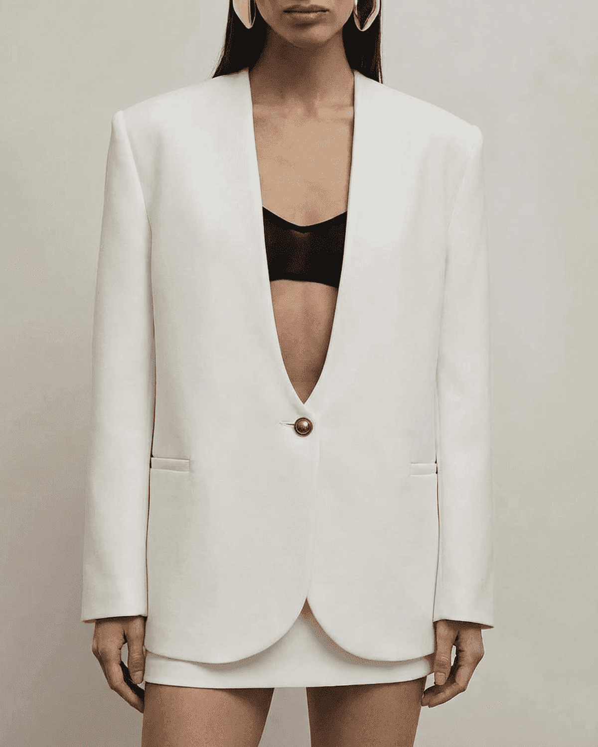 Alba Blazer by RAMBLION, women's tailored white blazer with deep V-neck and single-breasted design.