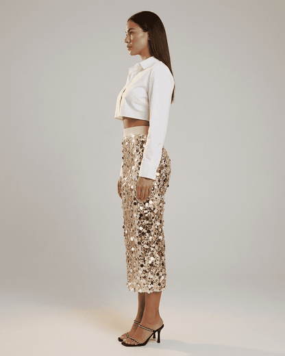 Aureline Midi Skirt by RAMBLION: Sequin high waist bodycon midi skirt showcased on model in profile view.