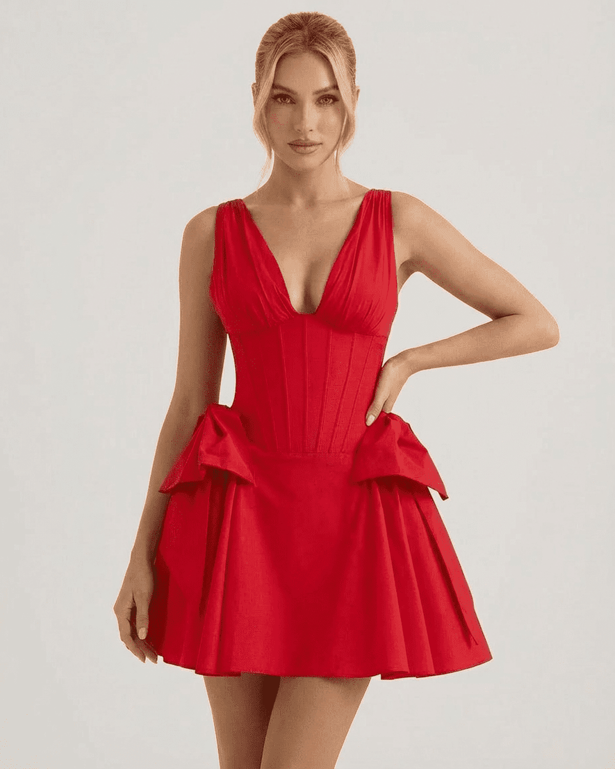 Aurora Mini Dress by RAMBLION in striking red with a V-neck corset bodice and pouf skirt.