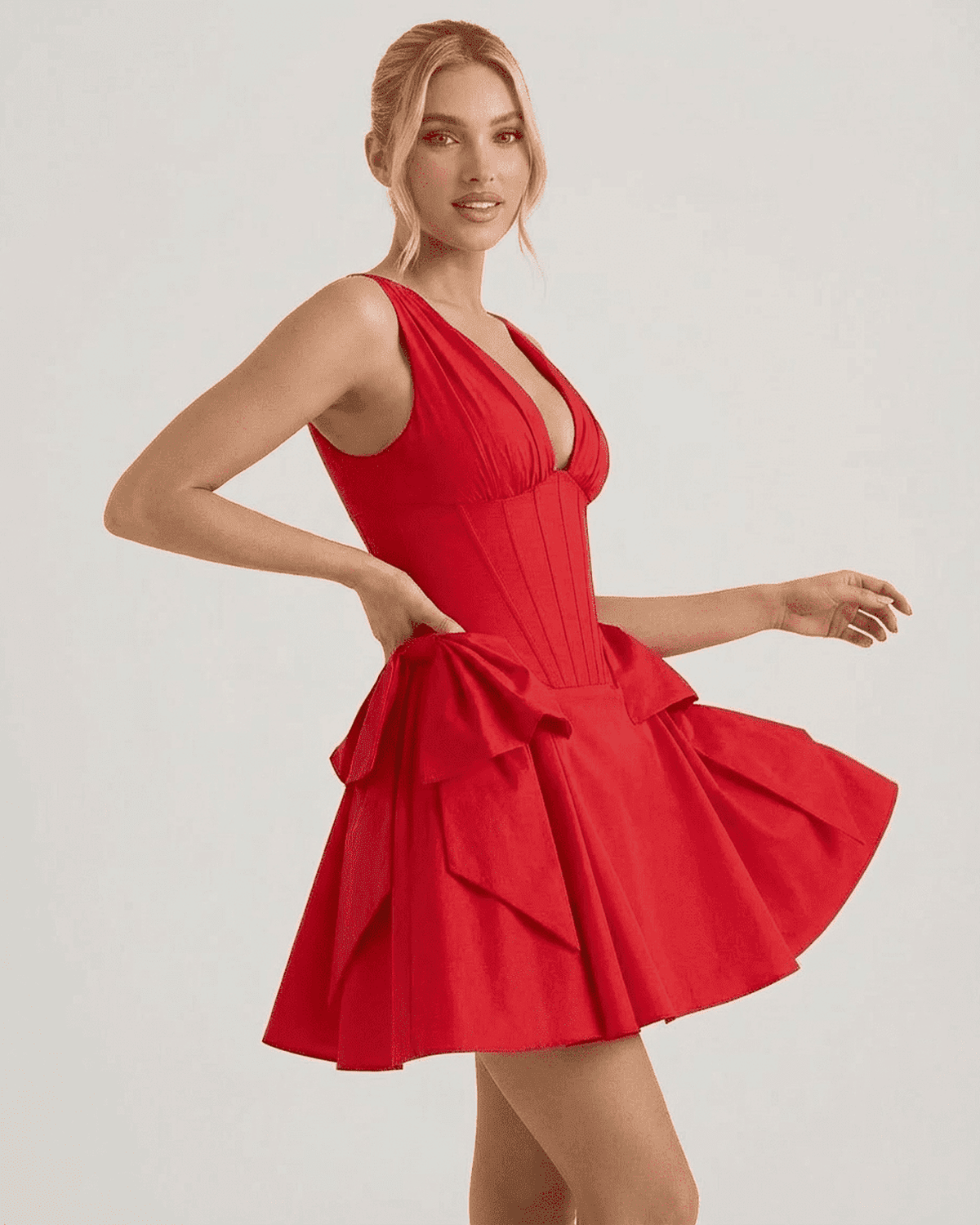Aurora Mini Dress by RAMBLION in red, showcasing a V-neck corset design and pouf skirt for a stylish party look.