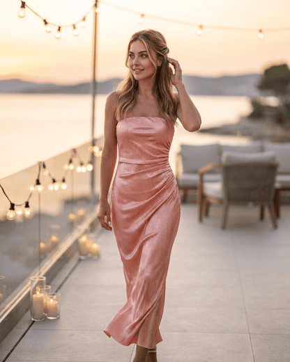 Champagne Maxi Dress by RAMBLION, showcasing a strapless silhouette with a subtle ruched texture in soft satin-like fabric.