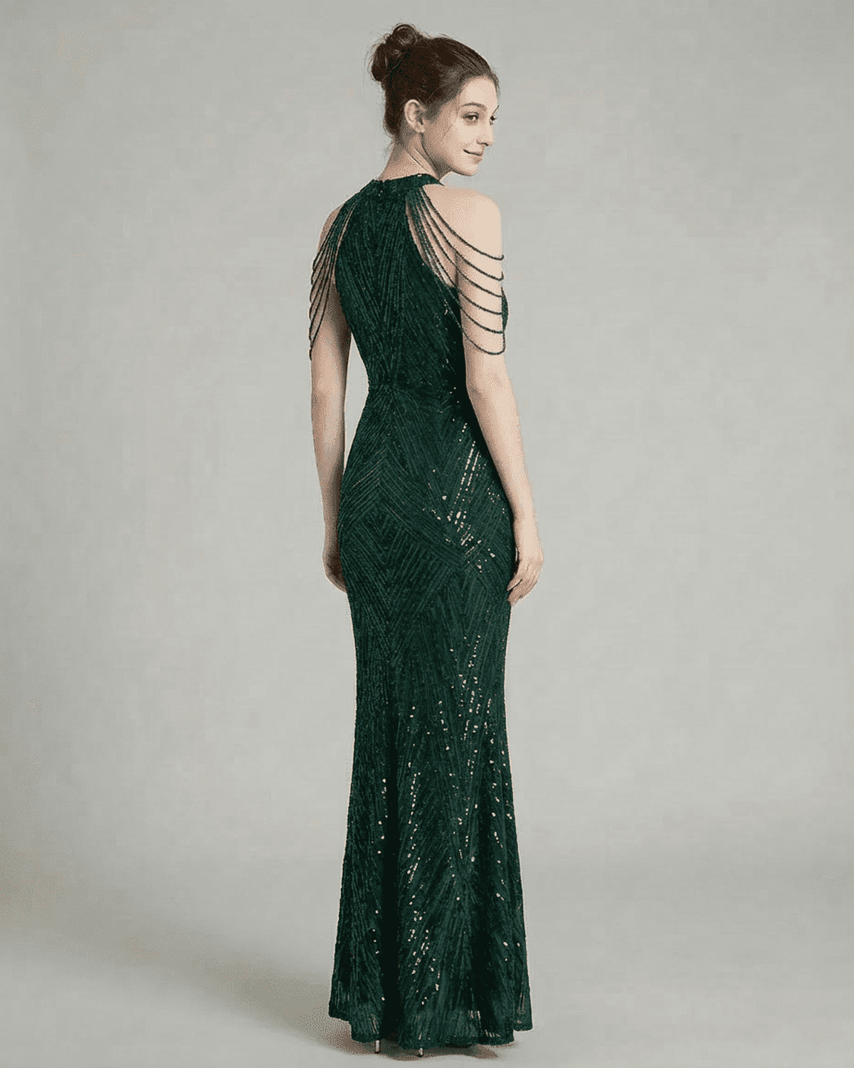 Emerald Maxi Dress by RAMBLION showcasing a stunning back view with elegant beaded shoulder drapes and sequin detailing.