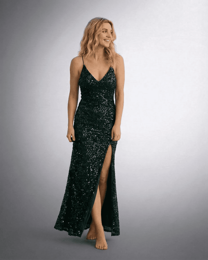 RAMBLION Luna Maxi Dress featuring a sleeveless design, deep green sequin fabric, V-neckline, and thigh-high slit for a glamorous look.