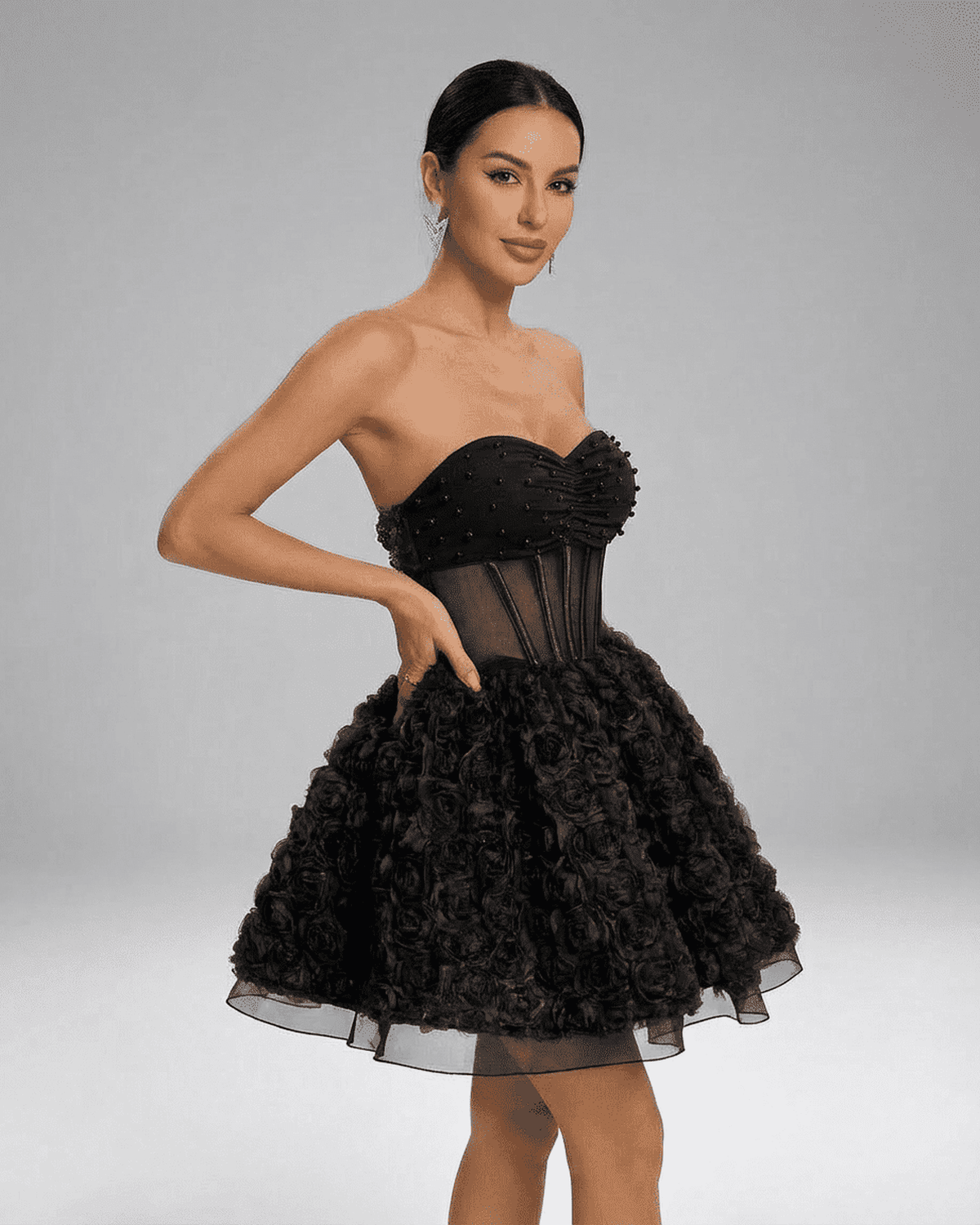 RAMBLION Noir Mini Dress - Beaded strapless puff mini with 3D floral texture and corset-style silhouette.