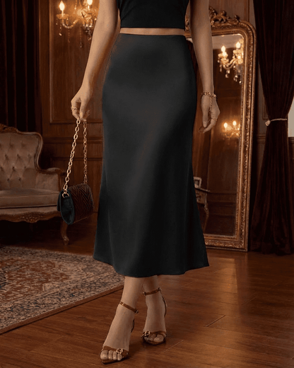 Noirelle Midi Skirt by RAMBLION, satin mermaid midi skirt in classic black, featuring a flattering silhouette.