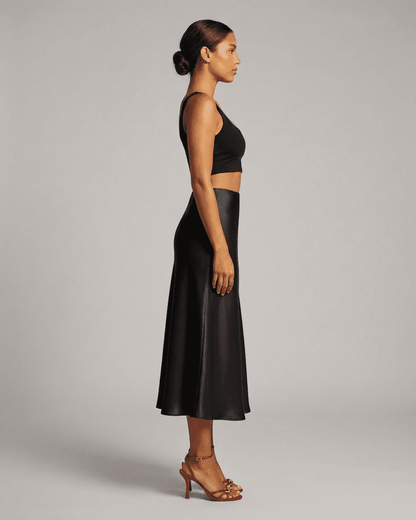 Noirelle Midi Skirt by RAMBLION, satin mermaid midi skirt in classic black, showcasing timeless elegance.