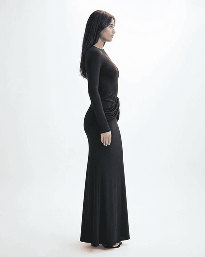 Orion Maxi Dress by RAMBLION featuring a long sleeve crew neck silhouette with ruched detail and a sleek black finish.