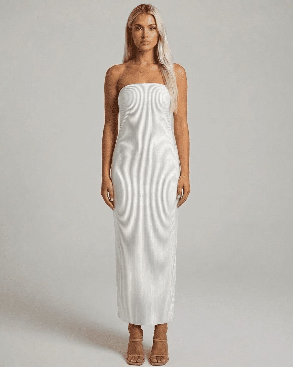 RAMBLION Pearl Maxi Dress featuring a strapless tube silhouette and subtle ruched texture for a modern, elegant look.