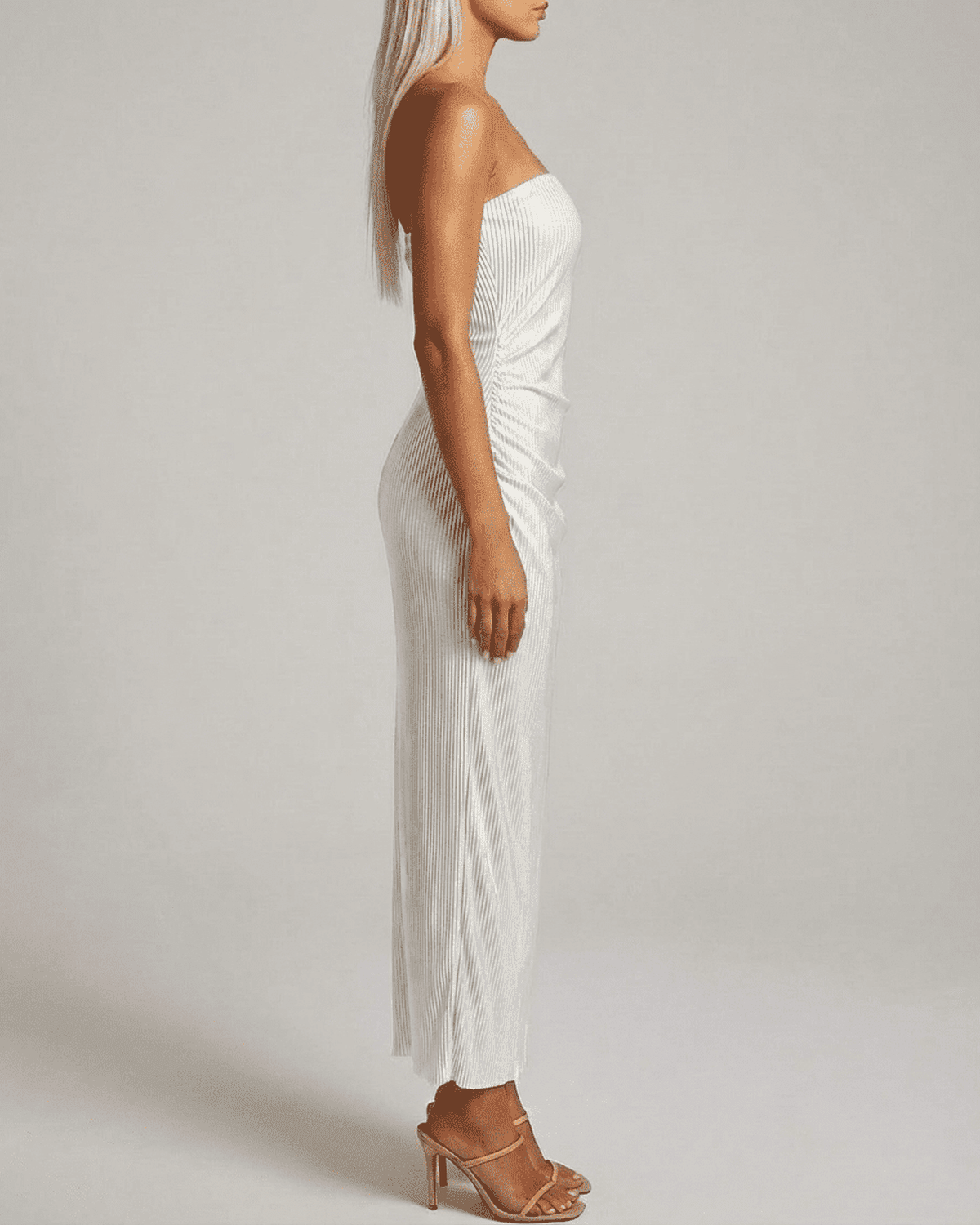 Pearl Maxi Dress by RAMBLION showcasing a strapless tube silhouette and subtle ruched texture for a modern elegance.